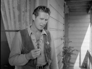 As  a deputy in "High Noon" 