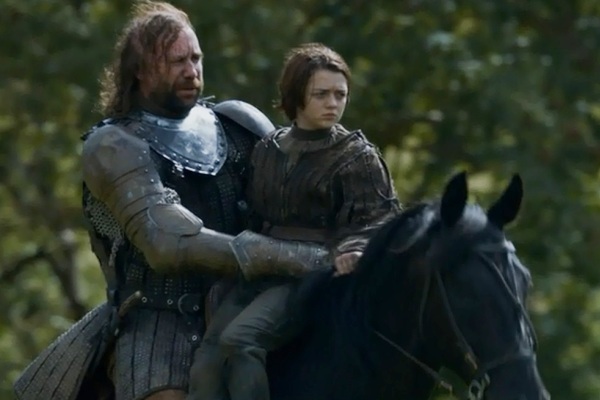 The Hound and Arya ride toward The Twins