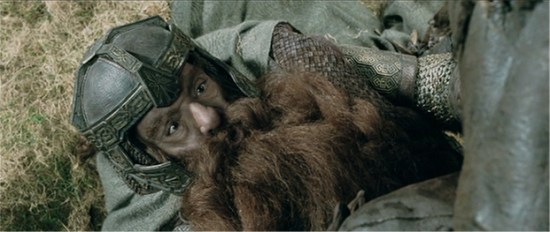 Gimli (John Rhys-Davies) provides some much-needed humor